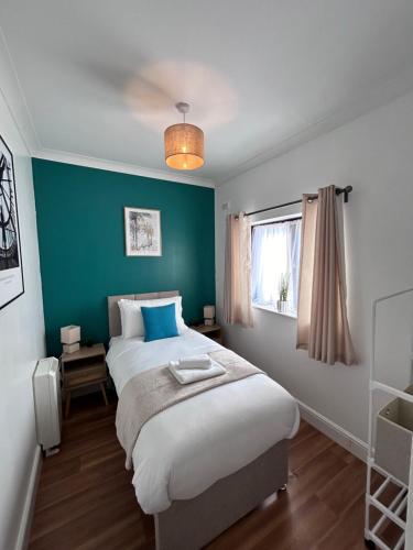 Ένα ή περισσότερα κρεβάτια σε δωμάτιο στο Southampton Dockside Stay by CB Stays