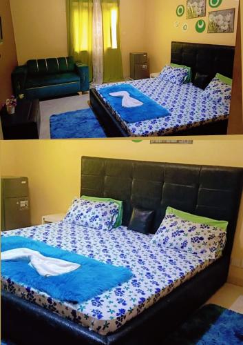 En eller flere senge i et værelse på Residence Onalo Yoff