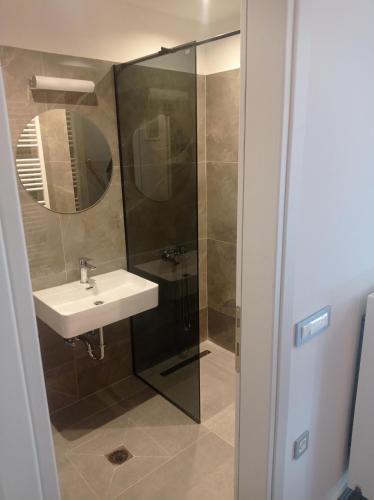 Ένα μπάνιο στο AK Apartments Ioa