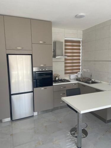 Η κουζίνα ή μικρή κουζίνα στο Penelope Apartments, Apartment 14
