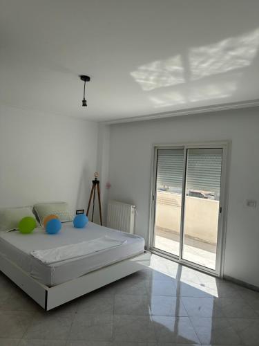 Postel nebo postele na pokoji v ubytování RoofTop Aouina Deluxe sans assesseur