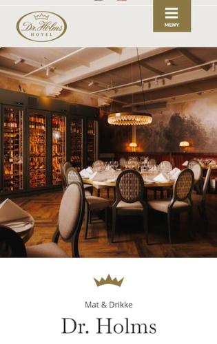 a dining room with tables and chairs and a chandelier at Toppleilighet Dr Holms in Geilo