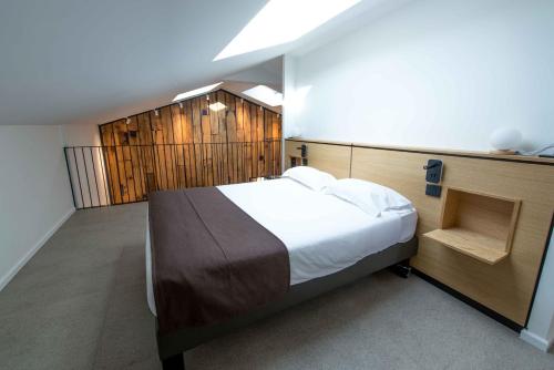 Ένα ή περισσότερα κρεβάτια σε δωμάτιο στο Suite- Appartement- Gite Erreguina