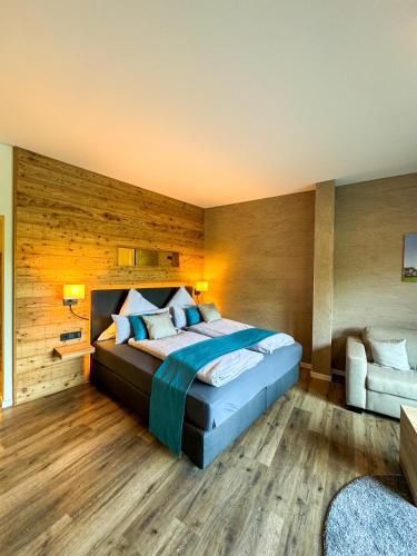 Postel nebo postele na pokoji v ubytování Veenland Hotel