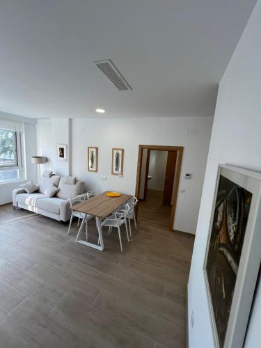 Ένα ή περισσότερα κρεβάτια σε δωμάτιο στο Apartamentos del Raval