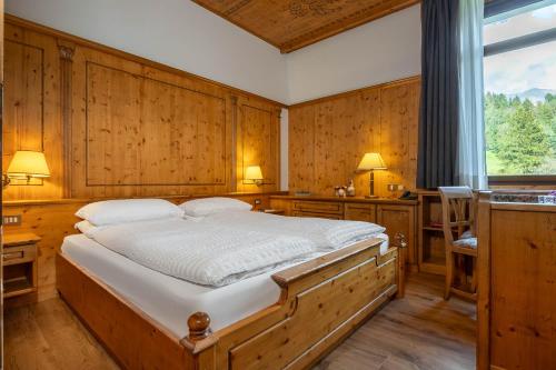 Postel nebo postele na pokoji v ubytování Hotel Vioz