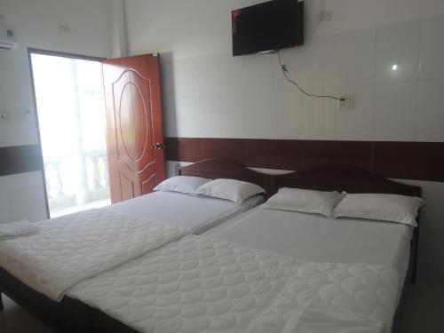 Una cama o camas en una habitación de Guest House 36 (2)