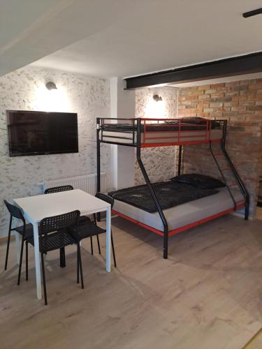 Ένα ή περισσότερα κρεβάτια σε δωμάτιο στο Loft House Noclegi Nysa