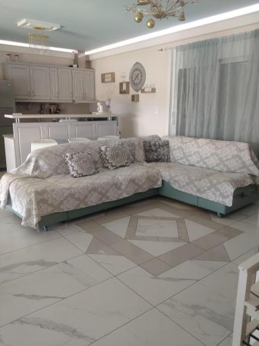 Kuchyň nebo kuchyňský kout v ubytování Λουτράκι Πανοράμα