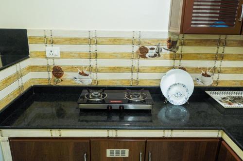 Una cocina o cocineta en Hilux Inn