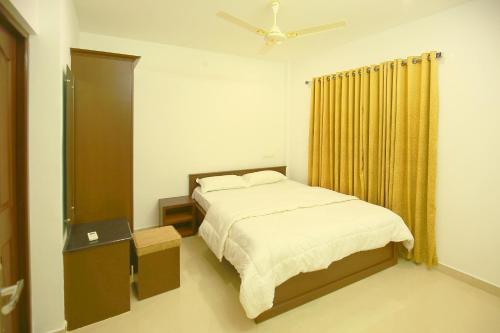 Una cama o camas en una habitación de Hilux Inn