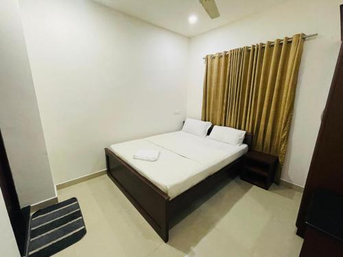 Una cama o camas en una habitación de Hilux Inn
