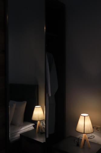 Postel nebo postele na pokoji v ubytování Horizons Hotel Rooms