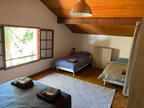 Postel nebo postele na pokoji v ubytování Maison landaise au cœur de Moliets