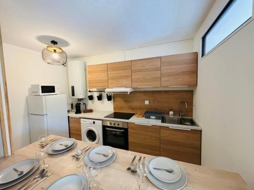 Kuchyň nebo kuchyňský kout v ubytování Happy Family- Appartement 3 chambres- Rez de chaussée