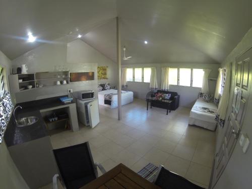 an aerial view of a kitchen and a living room at Savaii Lagoon Resort in Fagamalo