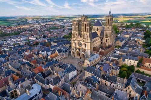 an aerial view of a city with a building at La Laonnoise in Laon
