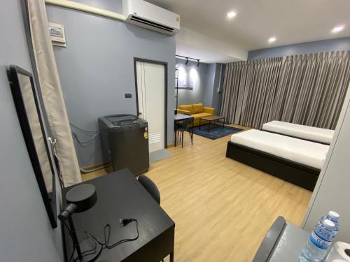 Ένα ή περισσότερα κρεβάτια σε δωμάτιο στο Bangyai Inn-private room
