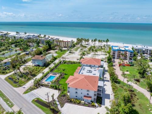 an aerial view of the resort with the ocean in the background at Breakers West A3 condo in Sanibel