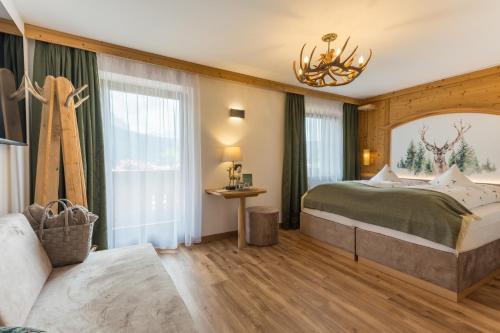 Postel nebo postele na pokoji v ubytování Hotel Jägerheim 3S