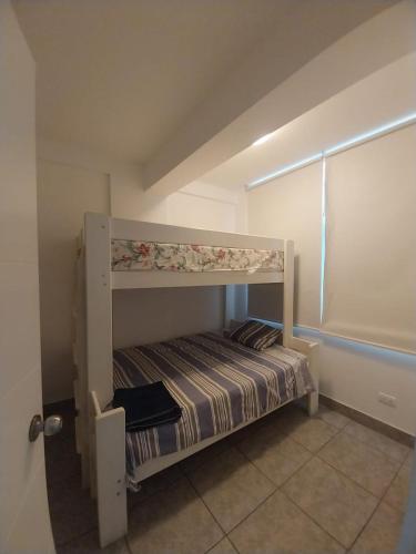 Кровать или кровати в номере Excelente departamento con vista al Mar - Punta Hermosa