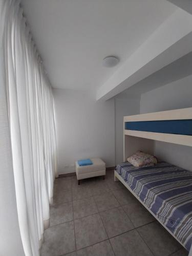 Кровать или кровати в номере Excelente departamento con vista al Mar - Punta Hermosa