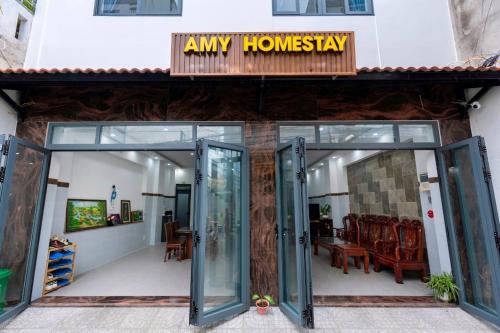 an entrance to a house with a sign that reads any housestay at AMY homestay in Vung Tau