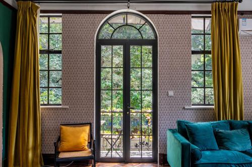 Zona de estar de Shanghai Century Old House Downtown B&B