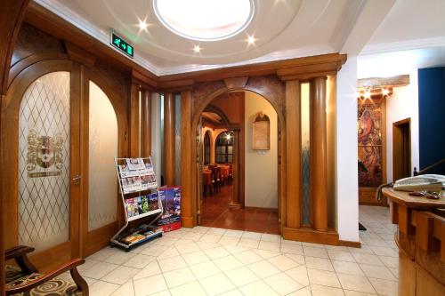 a hallway with wood paneling and a round ceiling at Panonija in Kotor