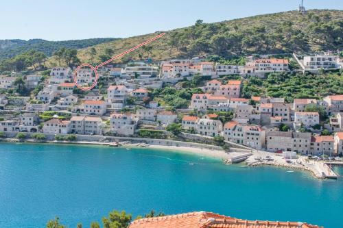 an aerial view of a town on a beach at Apartment Paradise Island in Pučišća