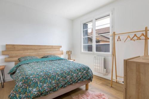 Postel nebo postele na pokoji v ubytování Portet - Appartement 4