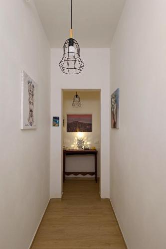 Ένα ή περισσότερα κρεβάτια σε δωμάτιο στο Casa Margherita
