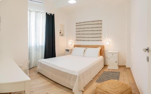Ένα ή περισσότερα κρεβάτια σε δωμάτιο στο Casa Noma nel cuore del Salento