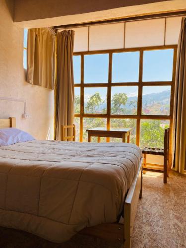 Postel nebo postele na pokoji v ubytování Banderas B&B