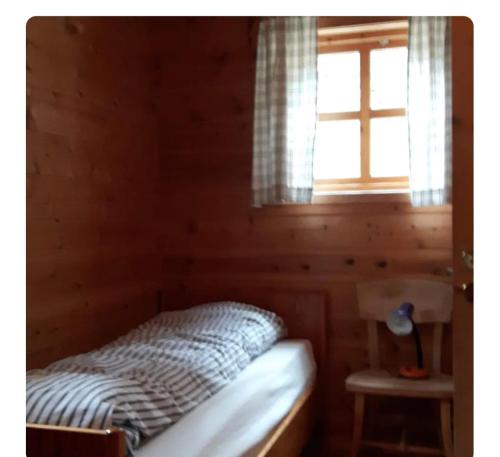 Postel nebo postele na pokoji v ubytování Kårhus på småbruk