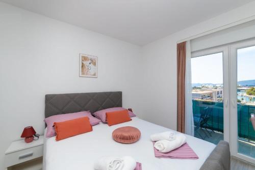 Ένα ή περισσότερα κρεβάτια σε δωμάτιο στο Apartman Angy