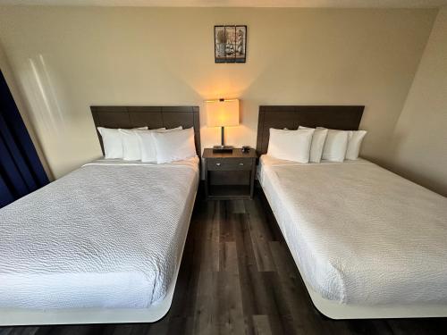 Ein Bett oder Betten in einem Zimmer der Unterkunft Inn at the Shore