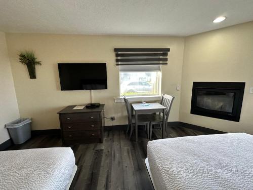 Ein Bett oder Betten in einem Zimmer der Unterkunft Inn at the Shore
