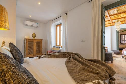 Un ou plusieurs lits dans un hébergement de l'établissement Riad YANNIS