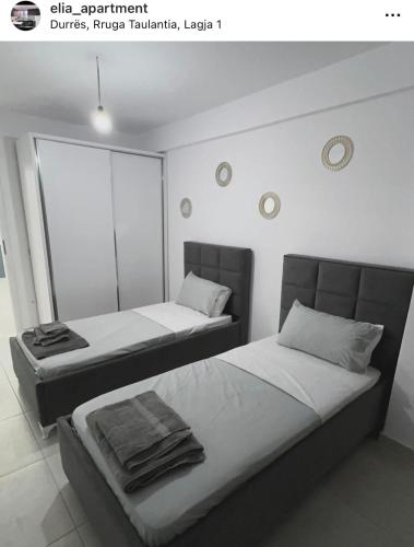 Tempat tidur dalam kamar di Elia 8A