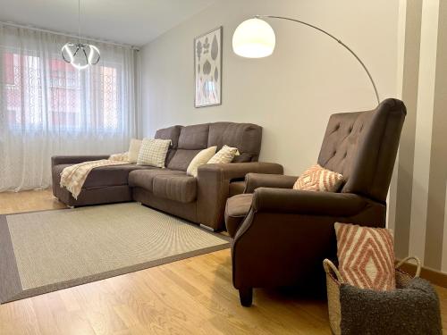 A seating area at Apartamentos 2K - Apartamento junto al casco viejo