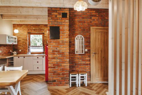Una cocina o cocineta en Skrzaci zakątek - domek z prywatną balią z jacuzzi