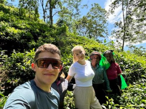 a group of people standing in a forest at Aqua Dunhinda Villa in Kandy