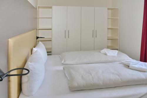 Postel nebo postele na pokoji v ubytování Resort Deichgraf Resort Deichgraf 27-09