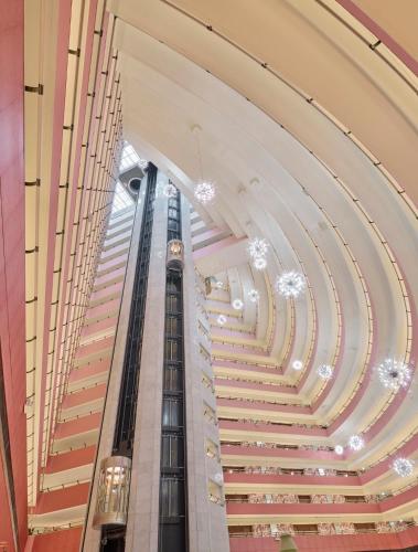 a view of the escalators in a building at Mandarin Oriental, Singapore in Singapore