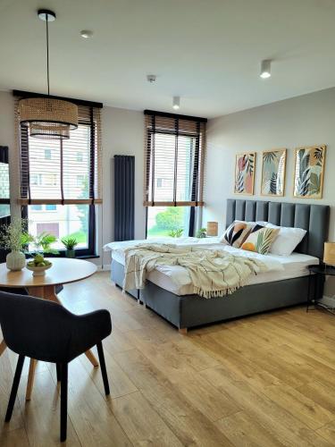 Ένα ή περισσότερα κρεβάτια σε δωμάτιο στο Apartamenty K17 Stare Miasto