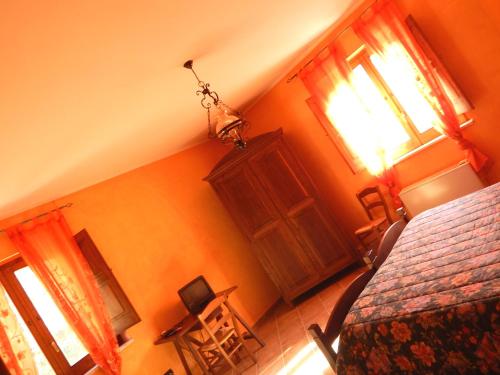 a bedroom with a bed and a wooden door at Tenuta Montelaura in Forino