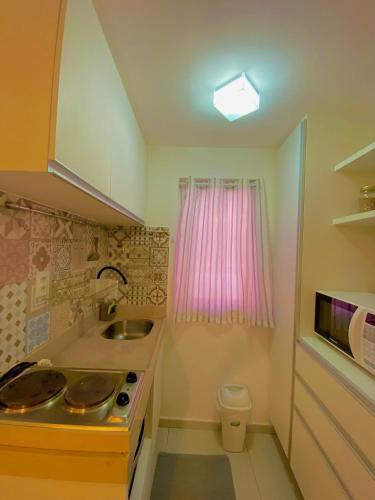 Dapur atau dapur kecil di Solar Água Apartaments