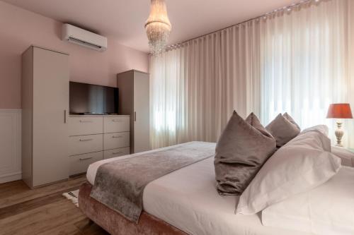 Ένα ή περισσότερα κρεβάτια σε δωμάτιο στο MURANO Place - MISTRO - 2 bedrooms
