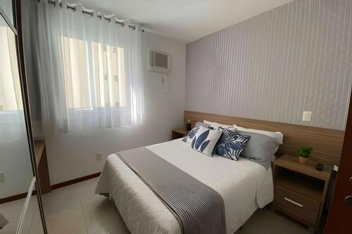 Uma cama ou camas num quarto em Atlantis by Mosaico Stays